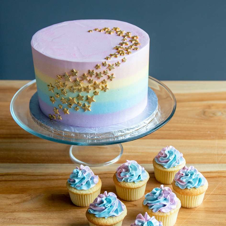 pastel stars and rainbows custom cake and cupcakes