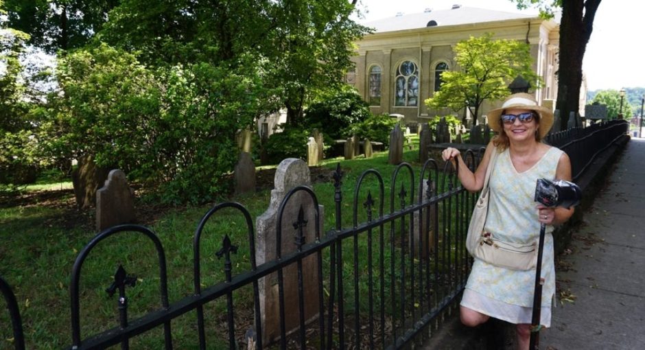 Ghost Tour Guide, Laura Still, standing next to cemetary in Knoxville, TN